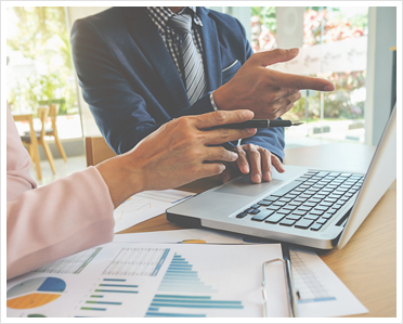Female Accountant Helping with Numbers Female Accountant Helping with Numbers